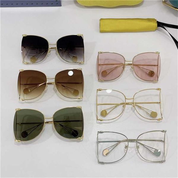 

sunglasses 2023 new g's fashion large frame a-frame covers face and shows thin star sunglasses of the same type gg0252, White;black