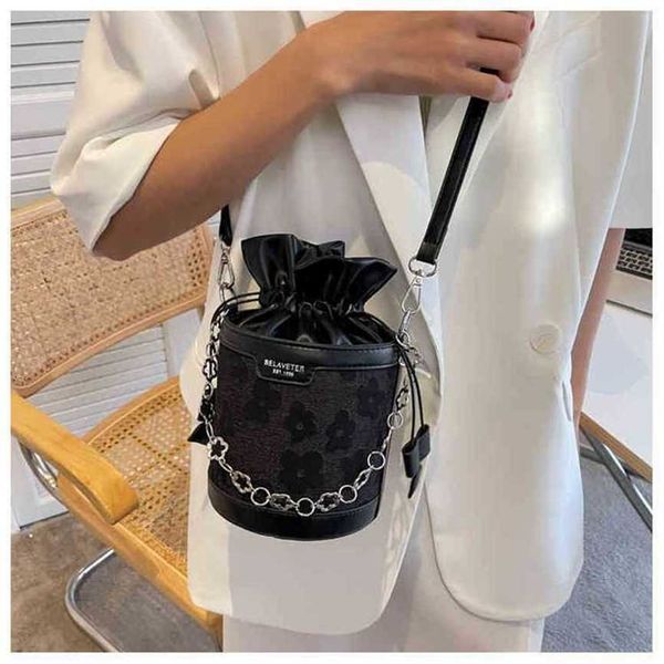 

handbag 2023 fashion women's bag leather quality handbag sense small female texture messenger niche chain portable bucket bag