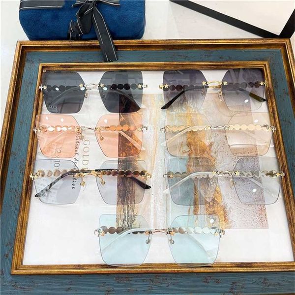 

sunglasses 2023 new g's fashion crystal diamond star rivet frameless square ni ni's sunglasses gg0644, White;black