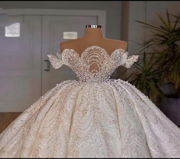 

luxury ball gown pearls wedding dresses lace appliqued sheer o neck dubai arabia bridal gowns vestidos de novias7791869, White