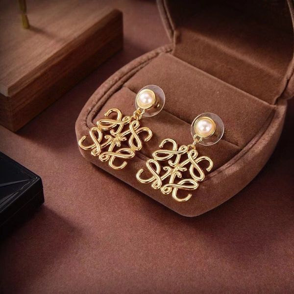 

gold and pearl earrings it's a selling fashion earrings, Golden