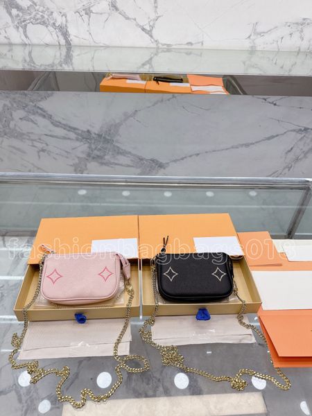 

mini pochette accessoires chic little pouch with golden chain embossed monograms leather handbag stylish elegant crossbody shoulder bag for