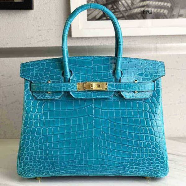 

designer bags birkin handbags herms tote high crocodile skin nile platinum 30 turquoise blue h hand sewn wax thread handbag have