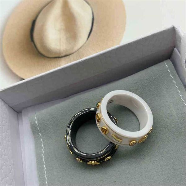 

earrings 2023 new gu small fragrance black and white ceramic couple feminine versatile star little ring female, Golden