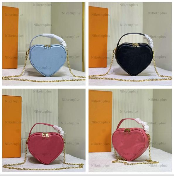 

pop my heart pouch mini bag heart-shape bubblegram quilted leather leather designers luxurys leather shoulder bag