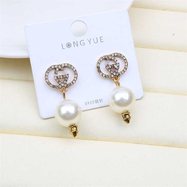 

2023 designer new pearl strawberry bronze tassel back hanging long temperament net red s925 silver needle tide round face earrings, Golden