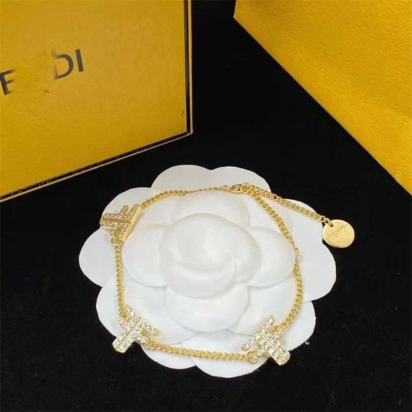 

2023 designer new early spring 2023 fenjia f letter rhinestone twist chain brass material sweet ladies elegant temperament bracelet, Black