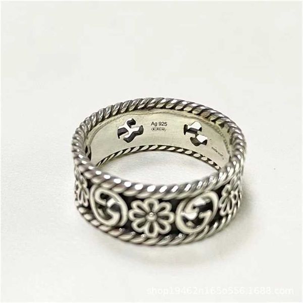 

2023 designer new fashion jewelry gujia mingchi hollow carved double skeleton little daisy flower couple wide and narrow ring male, Silver