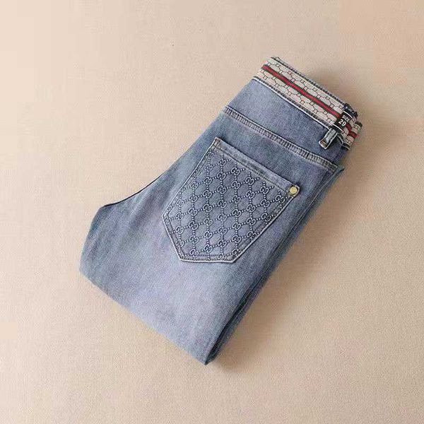 

men's 2023 light blue mid rise elastic jeans fashion simple handsome small straight leg pants