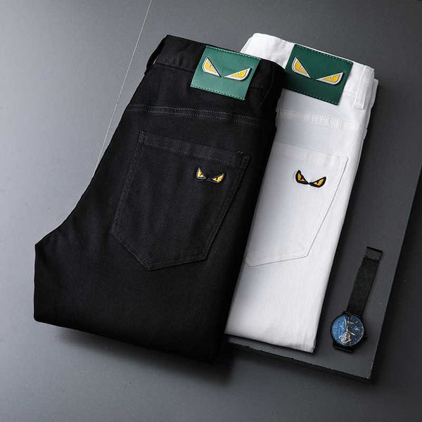 

jeans men's 2022 summer thin stretch slim fit small feet korean black and white embroidery casual pants fashion, Blue