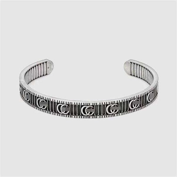 

2023 designer new jewelry sterling silver simple open  home personality vertical stripe bracelet for men and women, Black