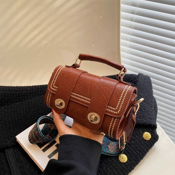 

small bag women's bag new fashion bag fashion handheld bag foreign style lock straddle bag
