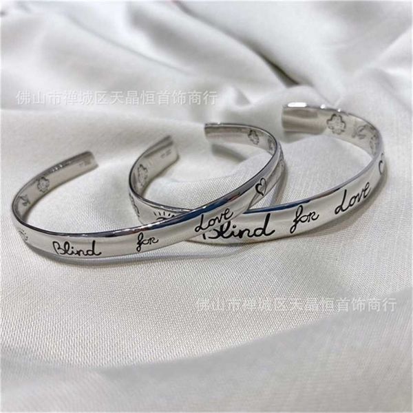 

2023 designer new fashion jewelry gujia 925 thai silver fearless flower and c-shaped simple personality fashion couple open bracelet, Black