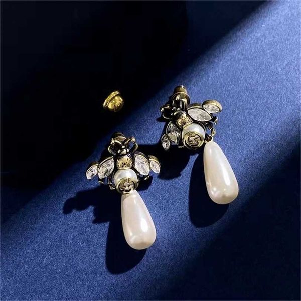 

2023 designer new jewelry fashion pearl female ancient home earrings, Golden