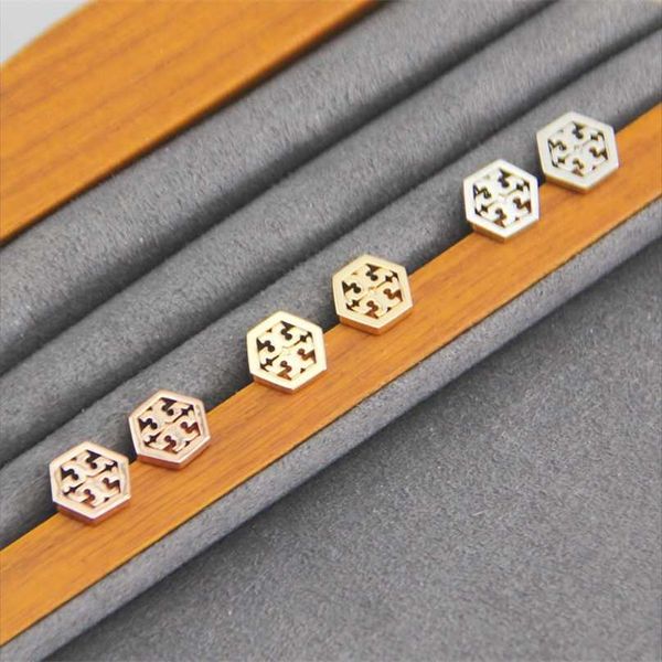 

2023 designer new t jewelry hexagonal smooth cut out simple style earrings copper plated with 18k real gold, Golden