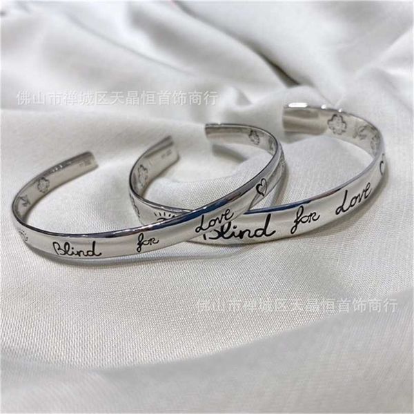 

2023 designer new fashion jewelry gujia 925 thai silver fearless flower and c-shaped simple personality fashion couple open bracelet, Black