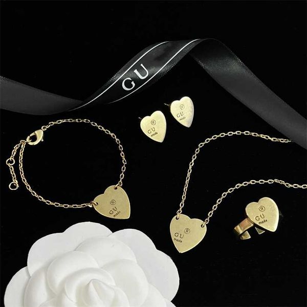 

2023 designer gujia 20 new carved heart pendant necklace adjustable premium feel bracelet male and female earring ring, Silver