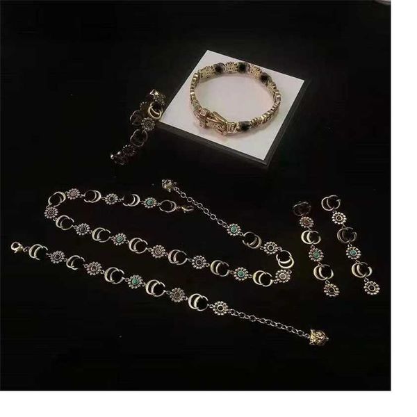 

2023 designer new gujia double g sunflower water diamond necklace ear studs bracelet brass material 925 silver needle, Gray