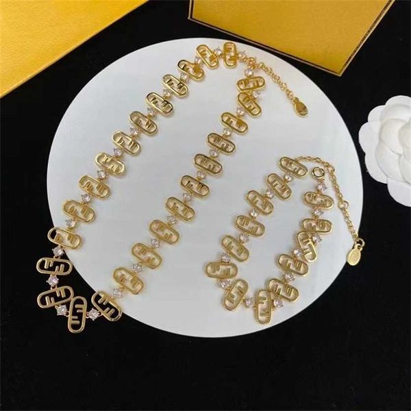 

2023 designer new fenjia multiple letter combination necklace diamond inlaid brass material non fading niche design sweater chain, Black