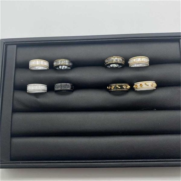 

2023 designer new fashion jewelry ancient family ceramic black white double letter element bee planet fashion male and female couple pair ri, Silver