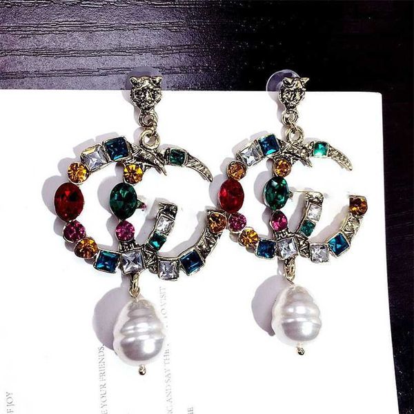 

2023 designer new colorful crystal exaggerated letter irregular pearl personalized earrings show face thin earrings, Golden