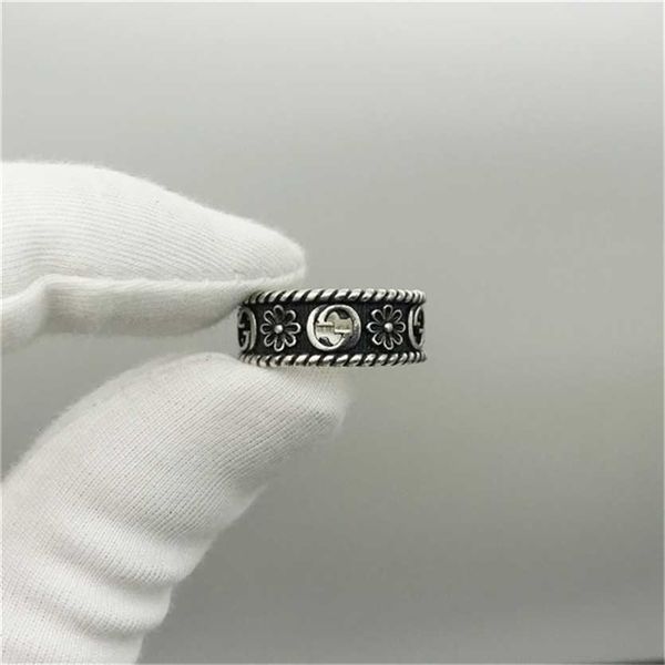 

2023 designer new fashion jewelry the ancient family daisy ring, male and female couples refer to hollow double twist rings., Silver