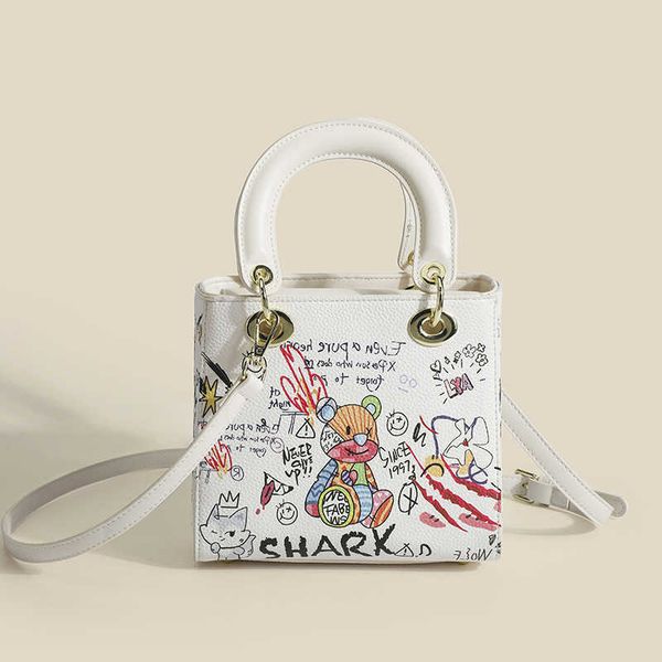 

2023 new bag female messenger bag graffiti handbag bear letter small square bag simple diana bag fashion