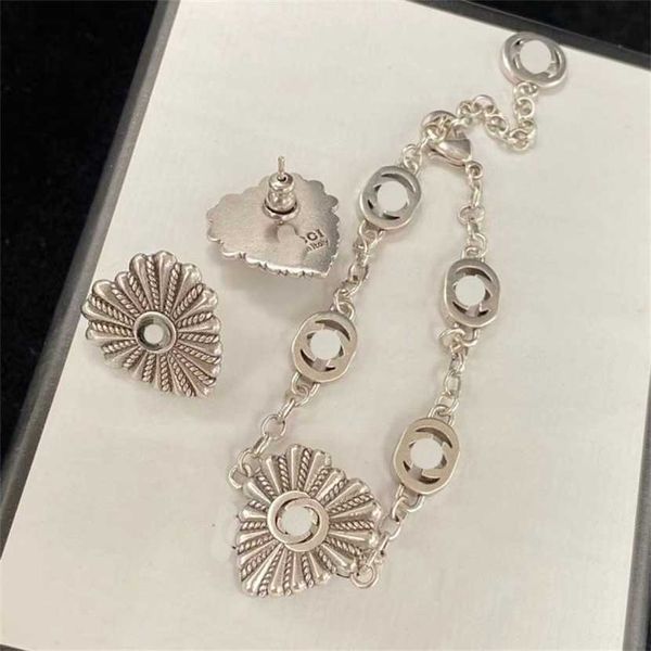 

2023 designer new gujia double g heart-shaped bracelet fashion versatile brass earrings female, Black