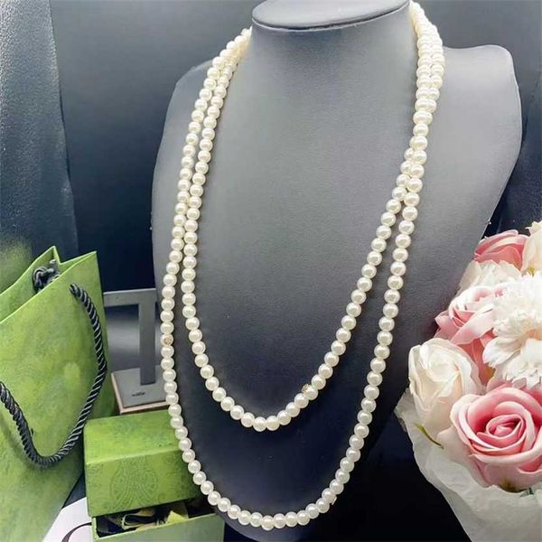 

2023 designer new 2023 gujia long pearl necklace fashion trend small design stars same sweater chain, Black