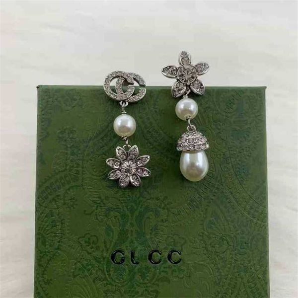 

2023 designer new family earrings gujia diamond inlaid pearl personalized fashion trend net red same, Golden