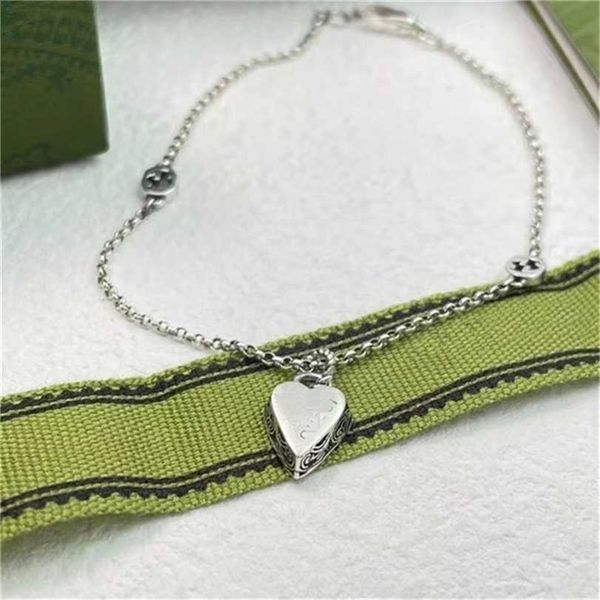 

2023 designer new fashion jewelry 925 silver double interlocking heart-shaped love bracelet for male and female couples with individual carv, Black