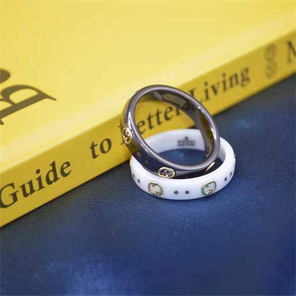 

2023 designer new jewelry double black and white ceramic line full circle bee planet star version couple ring, Silver