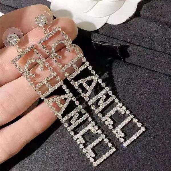 

2023 designer new home small fragrant feng shui diamond letter 925 silver ear studs temperament korean women's group same long earrings, Golden