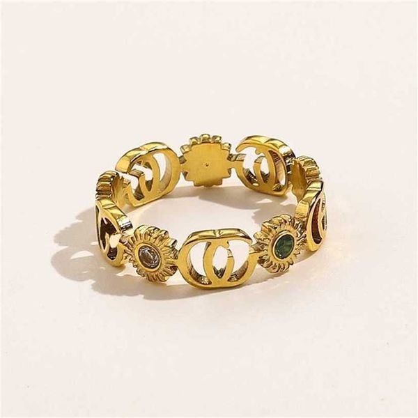 

2023 designer new jewelry stainless titanium steel bronze double letter flower set zircon couple ring, Silver