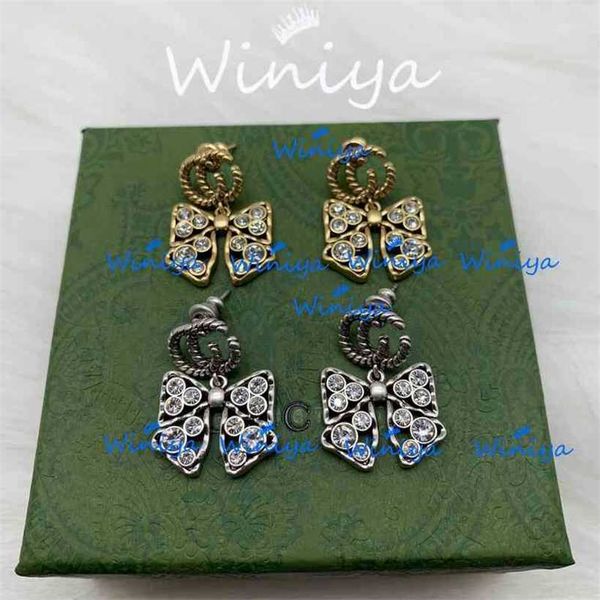 

2023 designer new earrings ancient family letter diamond studded bow feminine temperament net red same earrings, Golden