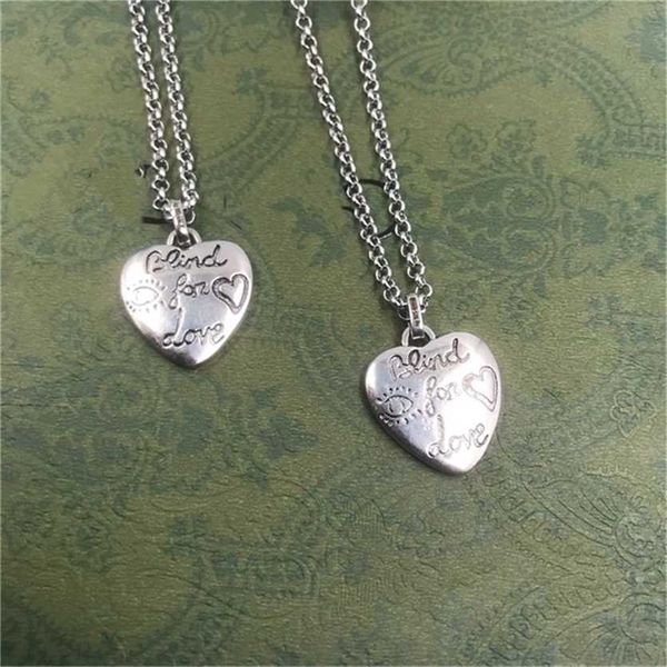 

2023 designer new fashion jewelry ancient family's same fearless blind for love carved heart pendant small fresh style personalized nec, Silver
