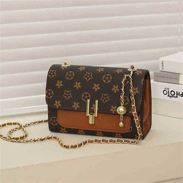 

handbag 2023 new bag letter printed female shoulder messenger hand chain golden ball small square