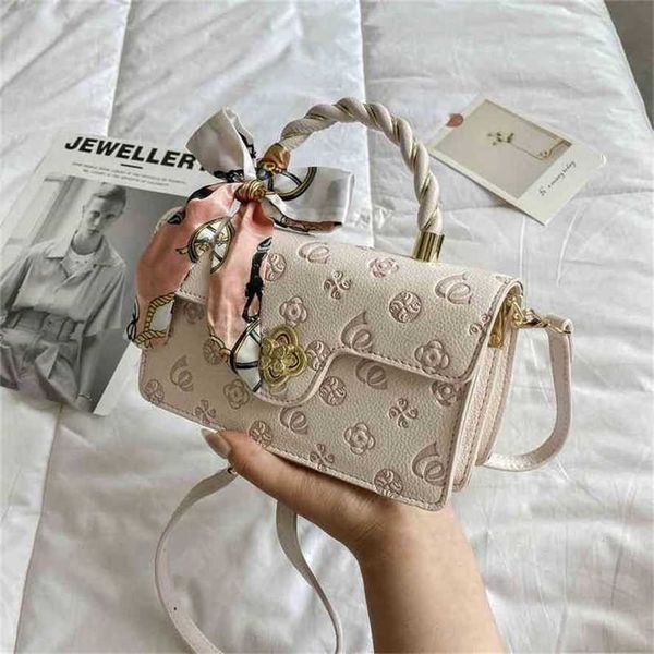 

handbag 2023 new bag minority female embossed pink small square portable shoulder messenger