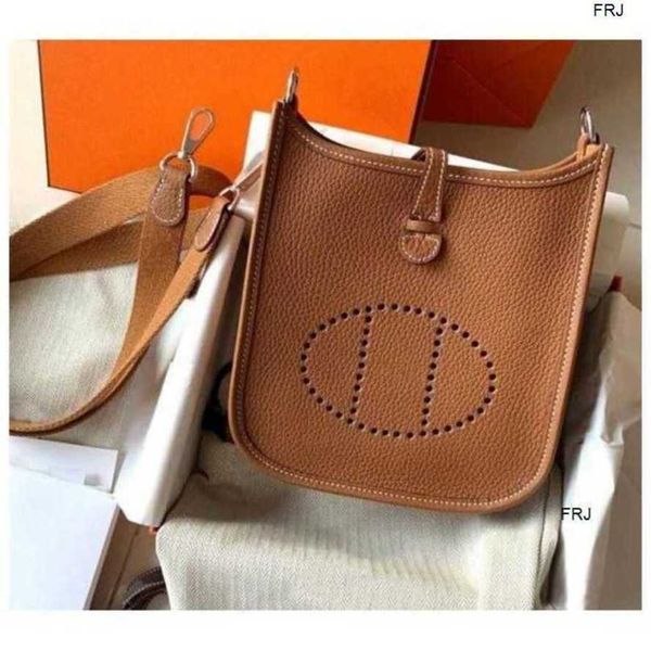 

designer evelyn bags brand 2023 new hollow bucket head layer cow leather lychee grain womens one shoulder cross body have logo
