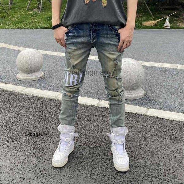 

mens jeans chao brand fog high street hole letter printing used washing elastic locomotive slim legged jeans, Blue
