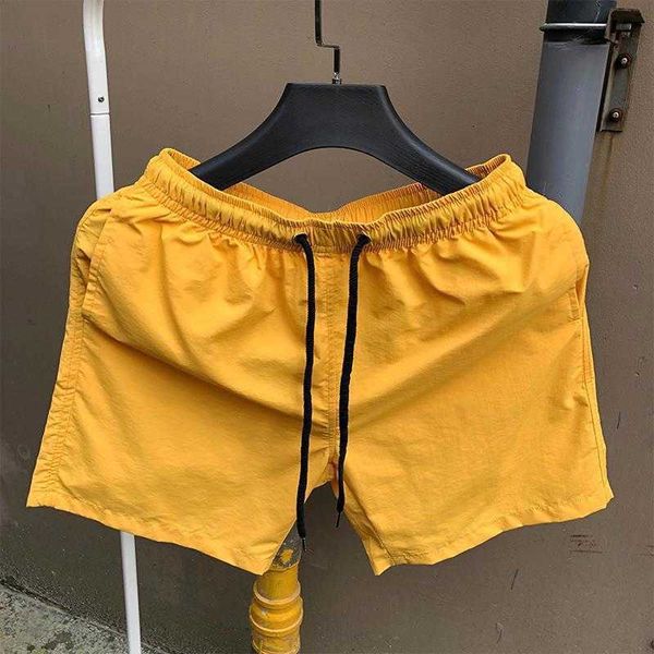

men's shorts quarter pants men's summer beach pants korean quarter pants quick drying shorts candy color loose thin sports shorts, White;black