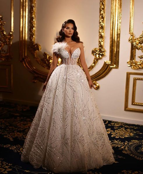 

sparkly ball gown wedding dresses v neck sleeveless feather sequins appliques diamonds beaded floor length ruffles lace-up bridal gowns plus, White