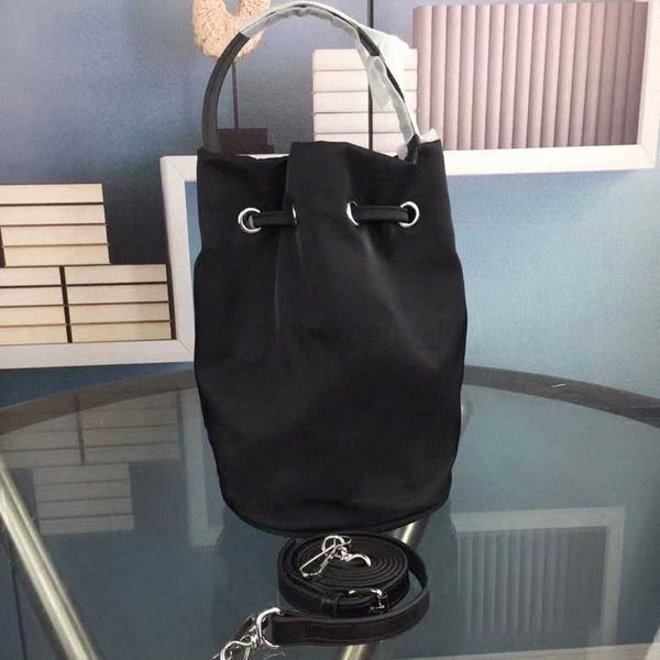 

b bag trainers wheel xs drawstring bucket bag recycled sport nylon embroidered bucket shape handbags adjustable crossbody strap luxury balan
