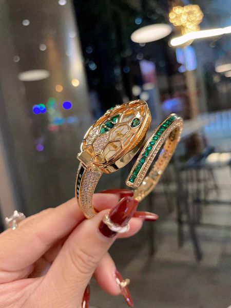 

diamonds women's watches bracelet snake quartz stainless steel strap multicolor casual watch, Slivery;golden