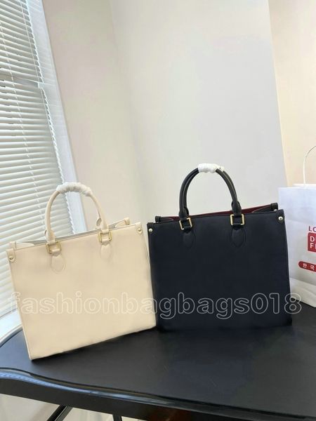 

designer onthego gm mm tote bags embossed luxury monograms leather handbags elegant carryall shoulder bag stylish bicolor pouch for shopping