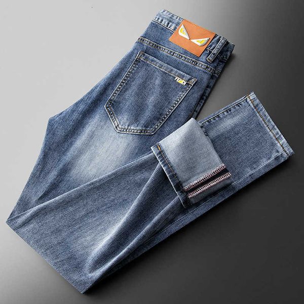 

2023 spring/summer light blue jeans men's fashion hardware decoration elastic slim fit small feet denim pants men