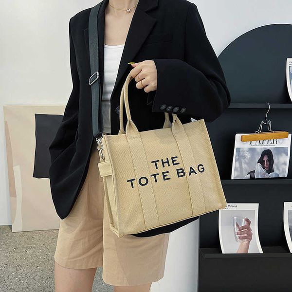 

2023 new spring tote bag simple solid letter women's handbag commuter large capacity crossbody canvas bag