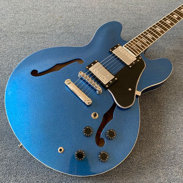 

electric guitar 335 blue metallic silver mahogany body and neck,chrome-plated hardware rosewood fingerboard,double f holes ing