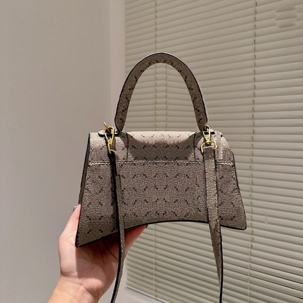 

pu women tote bag 2023 new designer bag serpentine appliques shoulder bags hasp trapeze fashion luxury handbags interior zipper pocket totes