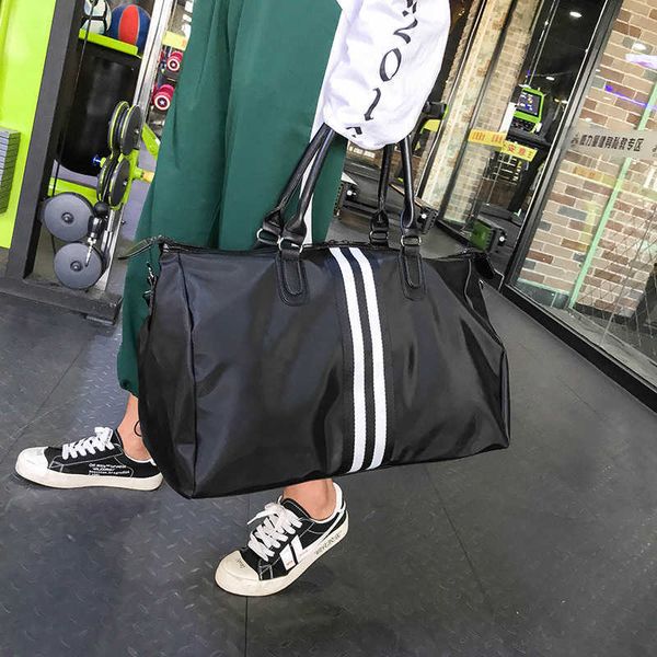 

duffel bags new short distance travel bag women s portable korean version luggage men s large capacity lightweight sports fitness 230316